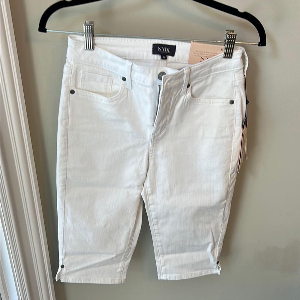NYDJ Crisp White bike capri jeans with rivets. Size 0. New with tags.